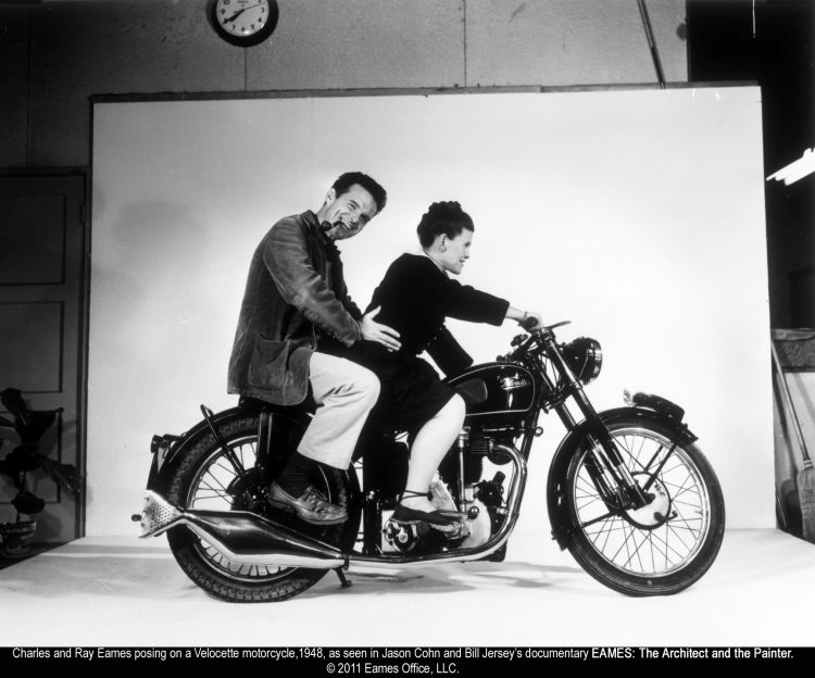 Charles and Ray Eames posing on a Velocette motorcycle, in 1948, as seen in Jason Cohn and Bill Jersey's documentary "Eames: The Architect and the Painter." © 2011 Eames Office, LLC.